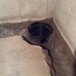 This picture shows an excavation along with a sump liner and French drain. The concrete floor was 12" thick; normally it's 4" thick.